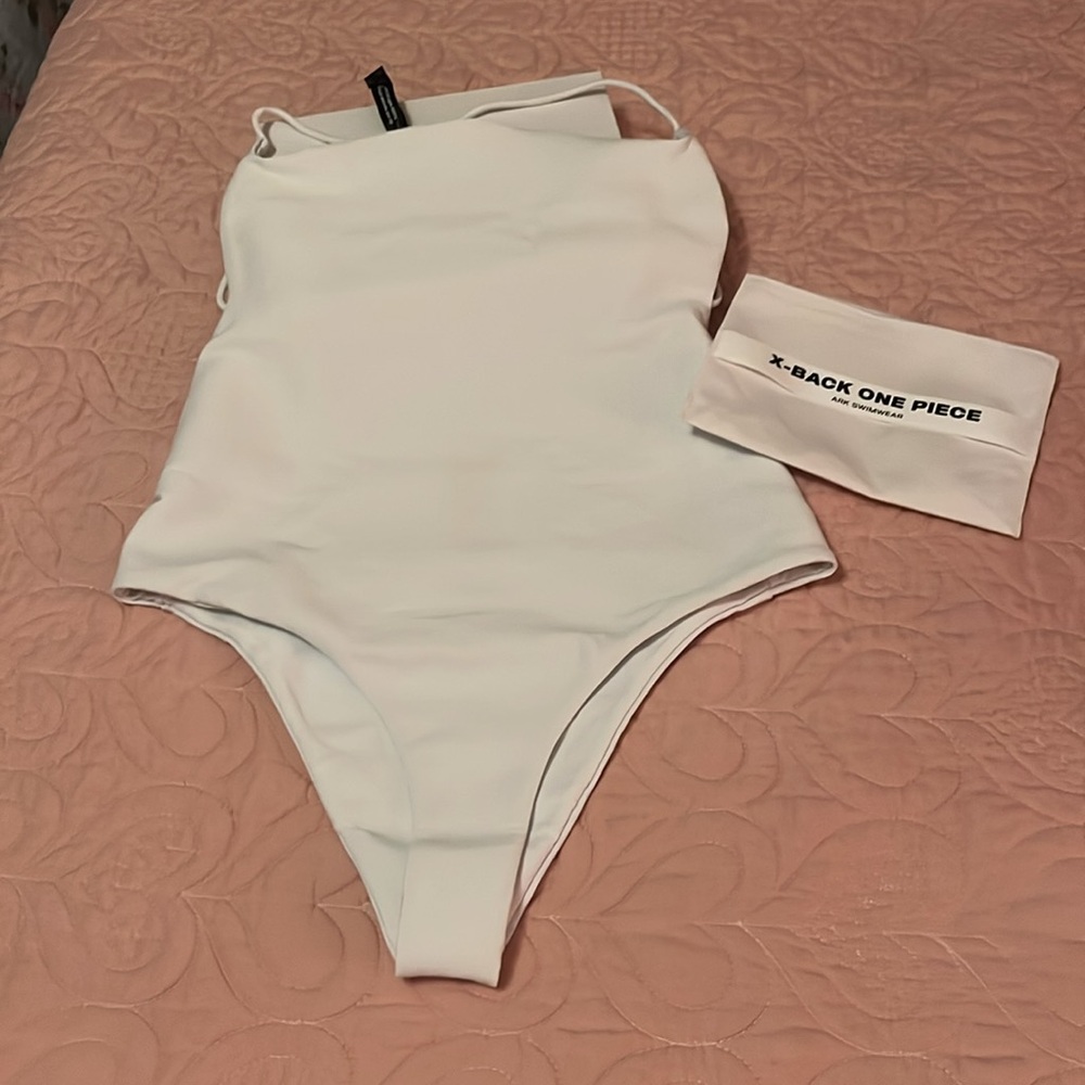 Ark one piece swim